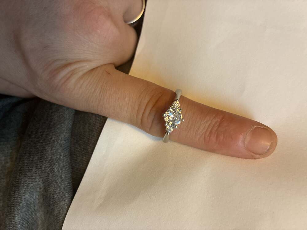 Three-Stone Round Cut Moissanite Engagement Ring with Bow Detail Setting